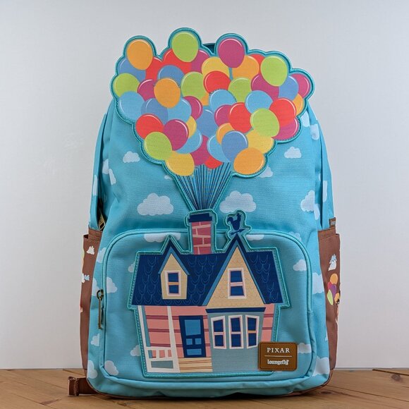Loungefly Handbags - NWT Loungefly Disney Pixar UP Balloon House Canvas Backpack